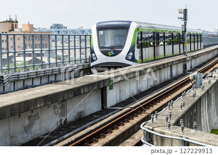 A Green Line train running on the elevated track of the Taichung Rapid Transit System in Taiwan. A Green Line train running on the elevated track of the Taichung Rapid Transit System in Taiwan. 127229913