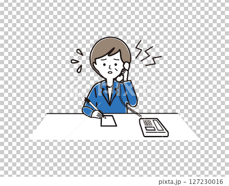 電話でクレーム応対をするミドル世代の女性 127230016