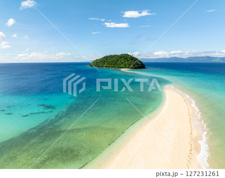 Ocean waves crashing over Bon Bon Sandbank. Beautiful scenery of turquoise sea water. Romblon Island. Romblon, Philippines. Ocean waves crashing over Bon Bon Sandbank. Beautiful scenery of turquoise sea water. Romblon Island. Romblon, Philippines. 127231261