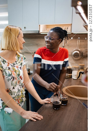 Joyful moments shared over coffee in a modern kitchen 127231857