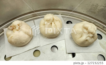 Steamed Dumplings on a Metal Steamer Rack Ready for Serving Steamed Dumplings on a Metal Steamer Rack Ready for Serving 127232255
