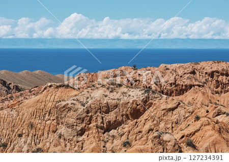 Skazka canyon, view on southern shore of Issyk-Kul lake, Kyrgyzstan 127234391