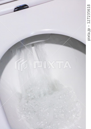 Maintain a clean toilet by using fresh water consistently and flushing it regularly Maintain a clean toilet by using fresh water consistently and flushing it regularly 127235618