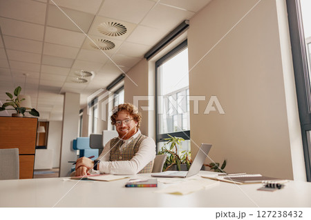 A Professional Woman Thriving in a Bright and Invigorating Office Environment Setting A Professional Woman Thriving in a Bright and Invigorating Office Environment Setting 127238432