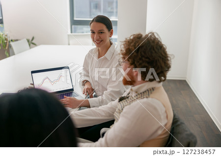 Engaging Business Meeting to Discuss Data Analysis in a Modern Office Setting with Teams Engaging Business Meeting to Discuss Data Analysis in a Modern Office Setting with Teams 127238457