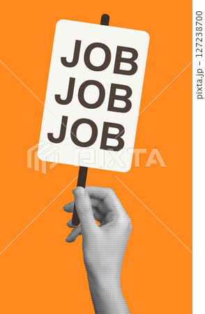 Worker holding protest sign. Employee raising placard demanding action on unemployment and labor Worker holding protest sign. Employee raising placard demanding action on unemployment and labor 127238700