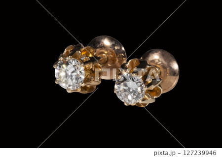 Diamond Earrings Isolated on White Background. Yellow Gold Diamond Earring Pair with 750 Stamp Denoting 18-Carat Yellow Gold. Diamond Earrings Isolated on White Background. Yellow Gold Diamond Earring Pair with 750 Stamp Denoting 18-Carat Yellow Gold. 127239946