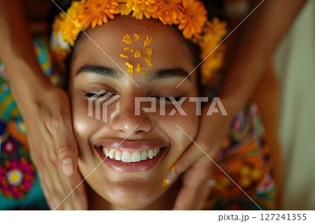 Woman smiling while receiving a relaxing head massage at a spa pampering wellness Woman smiling while receiving a relaxing head massage at a spa pampering wellness 127241355