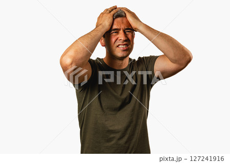 Man expressing frustration in a studio setting Man expressing frustration in a studio setting 127241916