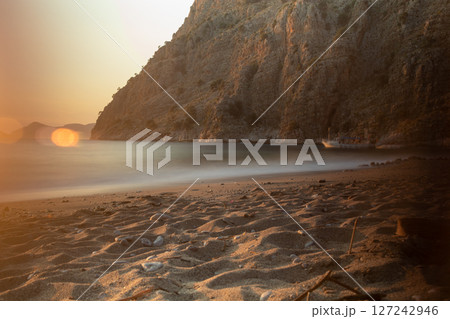 Golden Hour on a Quiet Cove 127242946