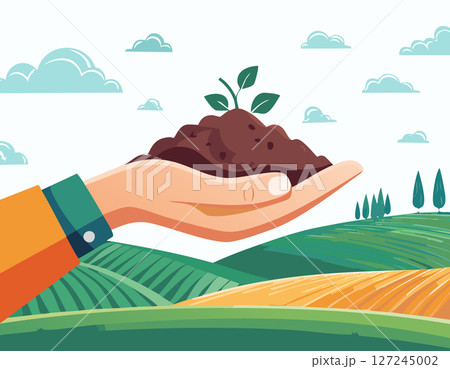 Hand filled with soil, floating above patterned farmland. Sunny landscape and simple shapes create a calm environmental scene, ideal for agricultural or eco-friendly messages. 127245002