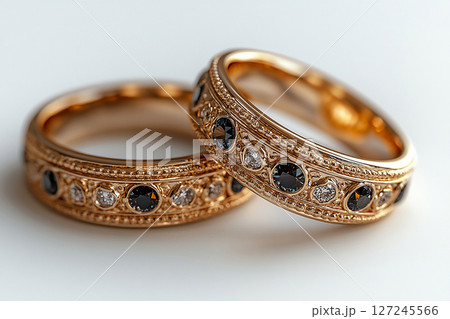 Luxury pair of Wedding Rings on a white background. Rococo Renaissance style. Luxury pair of Wedding Rings on a white background. Rococo Renaissance style. 127245566