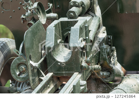Close-up of the control mechanism of a Soviet anti-tank gun, showing construction details and aiming components Close-up of the control mechanism of a Soviet anti-tank gun, showing construction details and aiming components 127245864