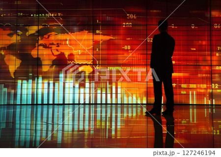 Professional man presenting financial charts on a large screen during a corporate meeting warm lighting 127246194