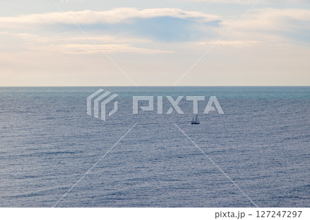 Lonely yacht in the sea 127247297