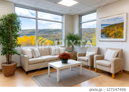 Modern waiting room overlooking beautiful autumn landscape 127247498