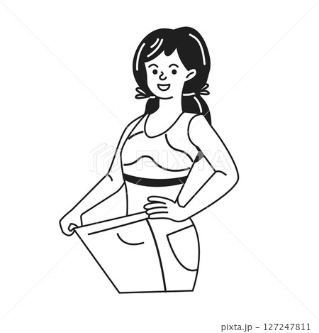 Happy Woman Holding Loose Pants in Confidence 127247811