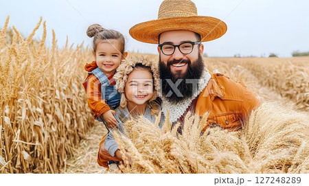 Happy family portrait in wheat field summertime fun children agriculture 127248289