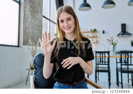 Web camera view of teenage girl talking looking in camera, online meeting, video call Web camera view of teenage girl talking looking in camera, online meeting, video call 127249844