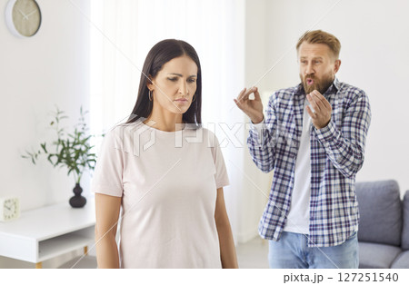 Married man and woman with relationship problems are arguing and quarreling at home 127251540