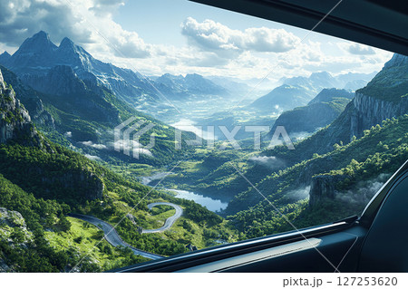 Photo of a mountain serpentine taken from a car window. Travel concept 127253620