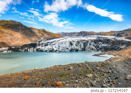 Impressive view on Solheimajokull glacier in Katla Geopark on Icelandic Atlantic South Coast Impressive view on Solheimajokull glacier in Katla Geopark on Icelandic Atlantic South Coast 127254197