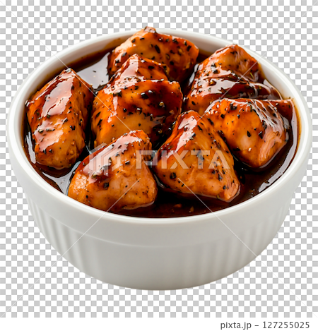 Delicious Glazed Chicken Pieces in White Bowl Full of Flavorful Sauce 127255025