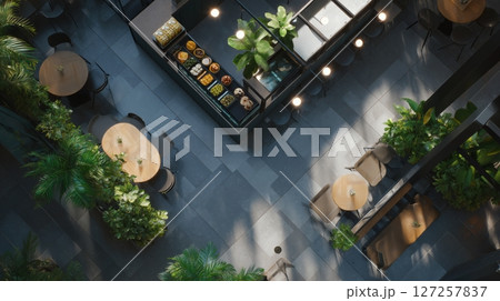 Indoor Cafe with Natural Light and Greenery 127257837