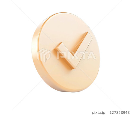 in a brightly illuminated setting, a sleek, light orange or golden, circular button like object with a dimensional check mark on its surface is prominently displayed 127258948