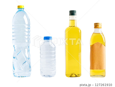 Vegetable oil and water plastic bottle isolated on white background, organic healthy food for cooking. Vegetable oil and water plastic bottle isolated on white background, organic healthy food for cooking. 127261910