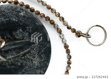 Close up View of Rusty Bath Water Plug or Drain Stopper with Lime on White Background Surface 127262441
