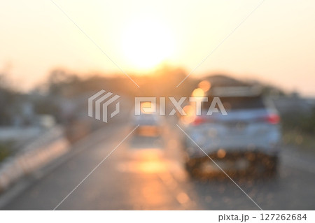 highway traffic with safety barrier on road asphalt, blurred image 127262684
