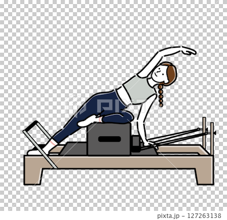 A woman stretching her side with machine pilates A woman stretching her side with machine pilates 127263138