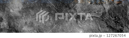 Detailed shot of weathered rock material and rough textures.Wide view. Copy space Detailed shot of weathered rock material and rough textures.Wide view. Copy space 127267054