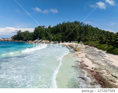 Tropical beach scenery. Seychelles, Mahe. Police Bay beach. 127267509