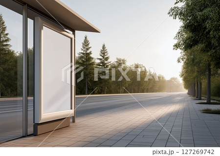 Modern Bus Stop at Sunrise Surrounded by Lush Green Trees on Quiet Urban Road 127269742