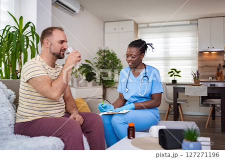 Caring professional helping with home consultation Caring professional helping with home consultation 127271196