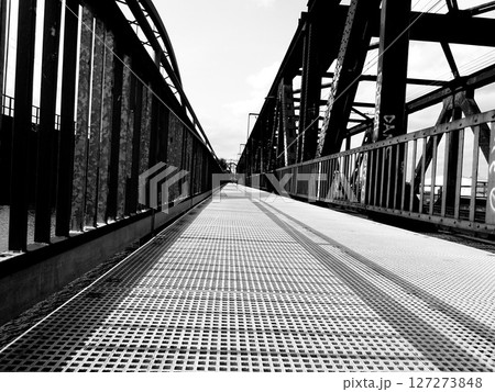 pedestrian bridge over the city 127273848