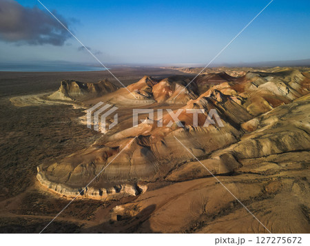 Aerial view of Aktumsik Cape's unique mound with visible layers and eroded base Aerial view of Aktumsik Cape's unique mound with visible layers and eroded base 127275672