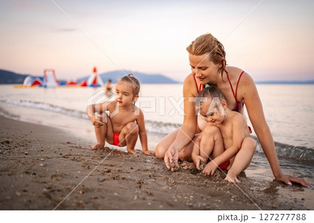 Summer fun by the beach with kids in Greece Summer fun by the beach with kids in Greece 127277788
