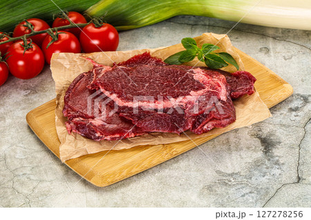 Raw beef cheeks cut for cooking Raw beef cheeks cut for cooking 127278256