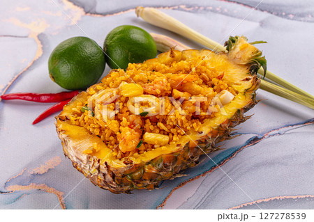 Seafood fried rice in pineapple half Seafood fried rice in pineapple half 127278539