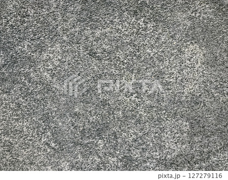 A grey and white background with a few small black dots A grey and white background with a few small black dots 127279116