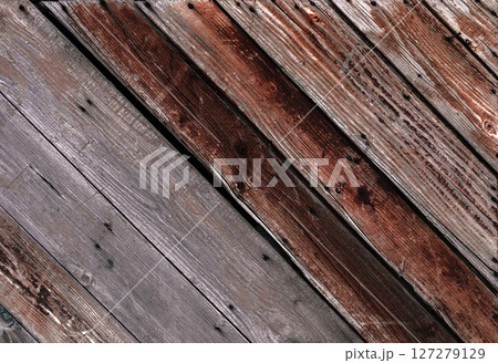 The image is of a wooden surface with a grainy texture 127279129