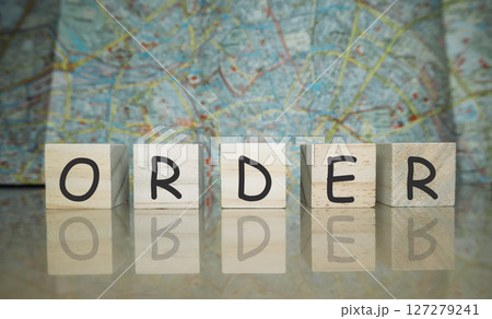 Wooden block with the word order written on it 127279241