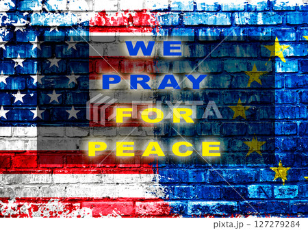 A flag with the words We pray for peace written on it 127279284