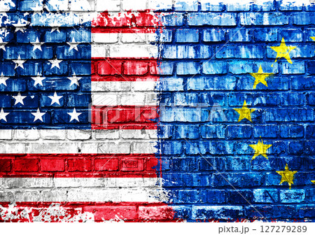A brick wall with a red, white and blue American flag on it 127279289