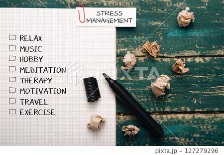A piece of paper with a list of stress management techniques written on it A piece of paper with a list of stress management techniques written on it 127279296