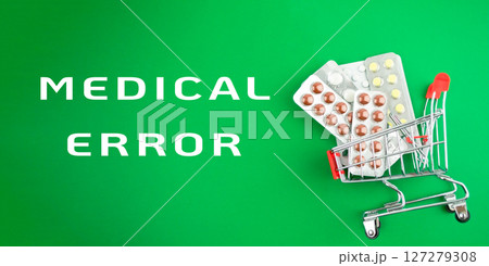 The cart is filled with pills and he is overflowing The cart is filled with pills and he is overflowing 127279308