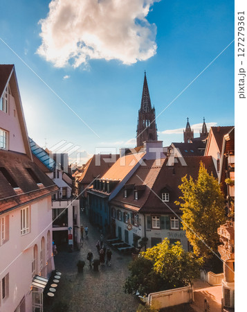 City street with a large building in the background City street with a large building in the background 127279361
